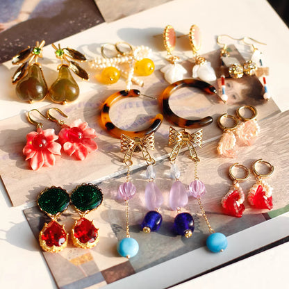 Vintage Chief Head Drop Earrings | Iridescent Glass & Antique Gold